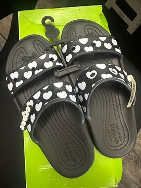 CROCS Black Slide Sandals with White Heart Print